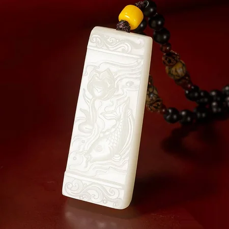 White Hetian Jade Plaque: Abundance Year After Year, 39.3 g