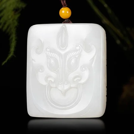 White Hetian Jade Plaque: Archaistic Animal Mask, 75.6 g