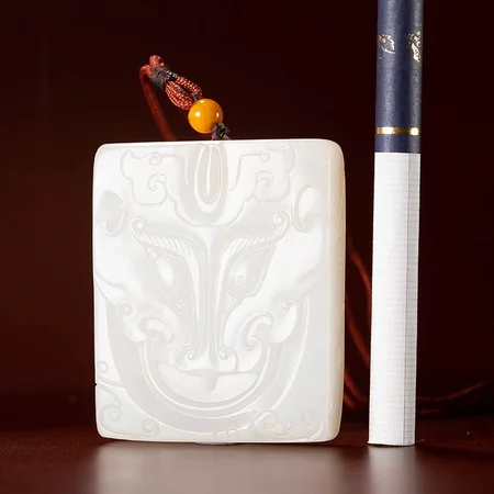 White Hetian Jade Plaque: Archaistic Animal Mask, 65 g