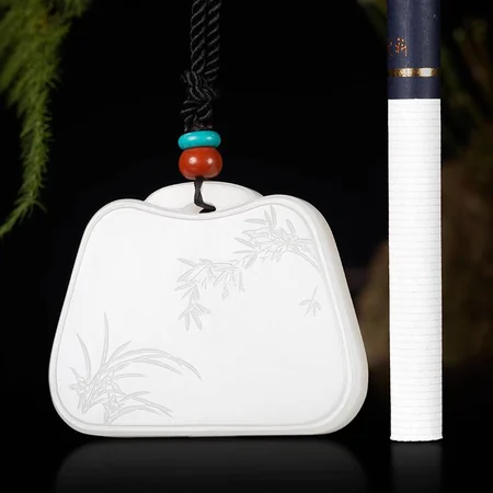 White Hetian Jade Plaque: Orchid and Bamboo, 31.3 g