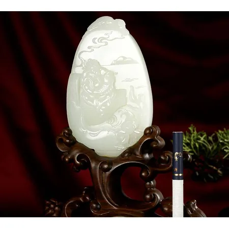 White Hetian Jade Fisherman Sculpture with Red Skin