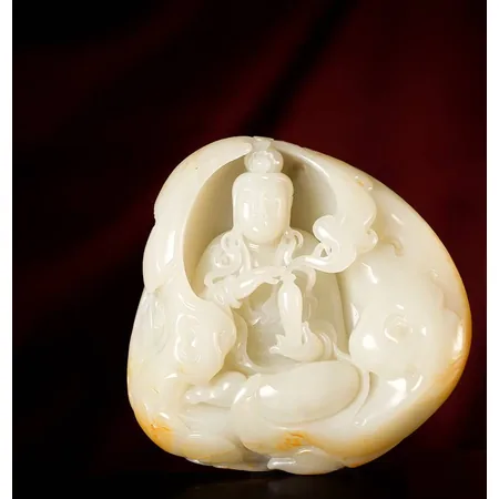 White Hetian Jade Guanyin Sculpture with Yellow Skin