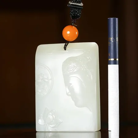 Yellow-Skin White Hetian Seed Jade Palm Carving - Guanyin, 136.1 g